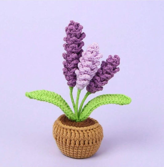Crocheted lavender plant with purple and light purple flowers in a tan pot