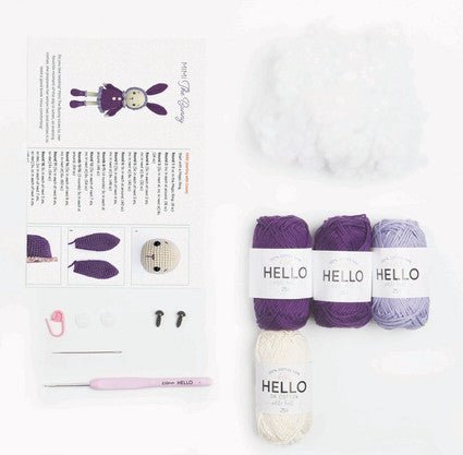 Purple yarn and craft supplies for knitting a bunny rabbit soft toy kit