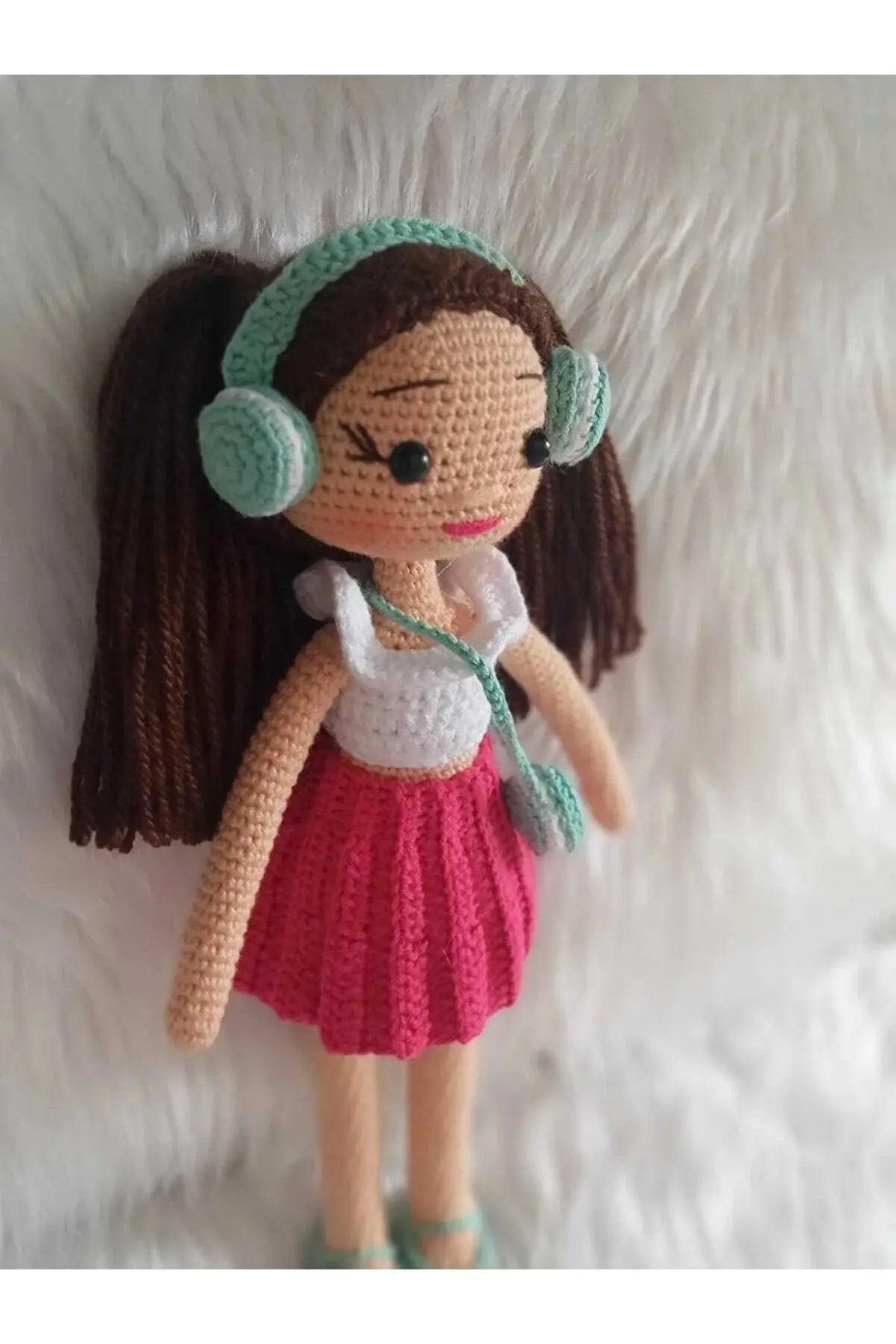 Crochet Little Girl Toy in Pink Skirt Listening to music - Joy Gift London