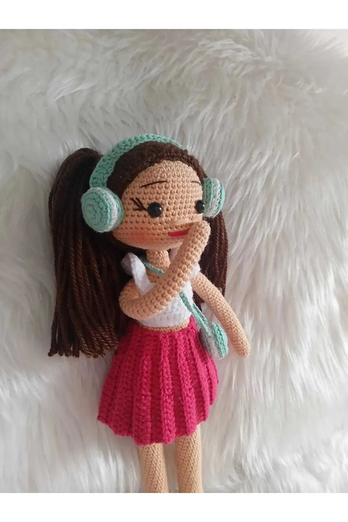 Crochet Little Girl Toy in Pink Skirt Listening to music - Joy Gift London