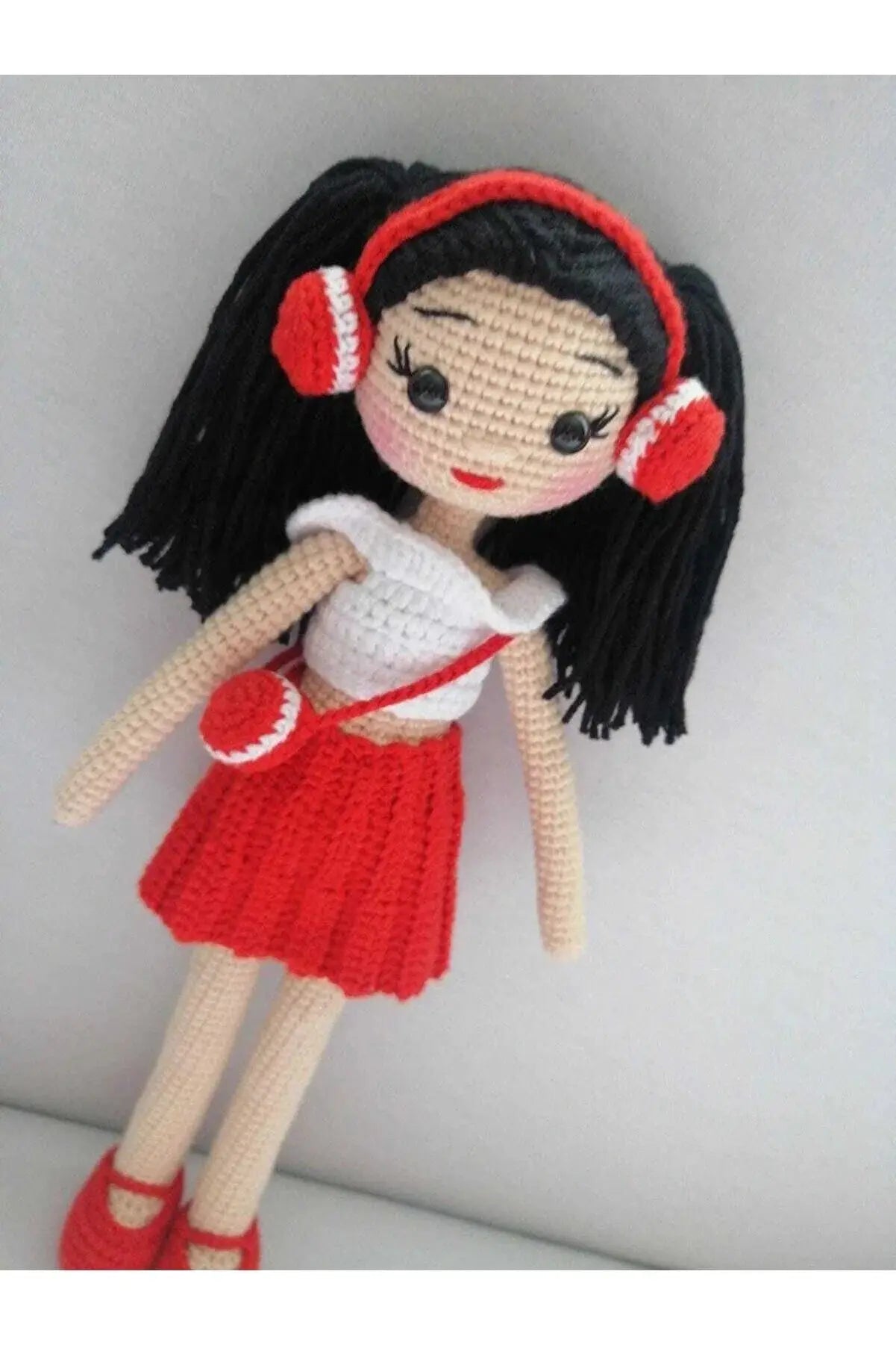 Crochet Little Girl Toy in Red Skirt Listening to music - Joy Gift London