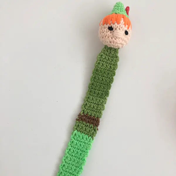 a crocheted toothbrush holder with a crocheted toothbrush holder