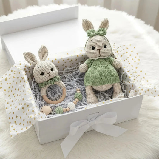 Handmade crochet bunny dolls in a gift box with teething ring and accessories