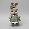 Crocheted bunny in sage green dress with white collar and matching bow