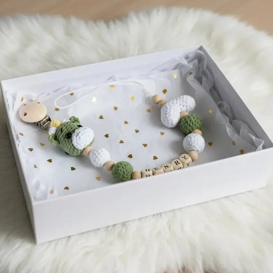 Crocheted pacifier clip with wooden beads and green teddy bear, personalized with name Henry