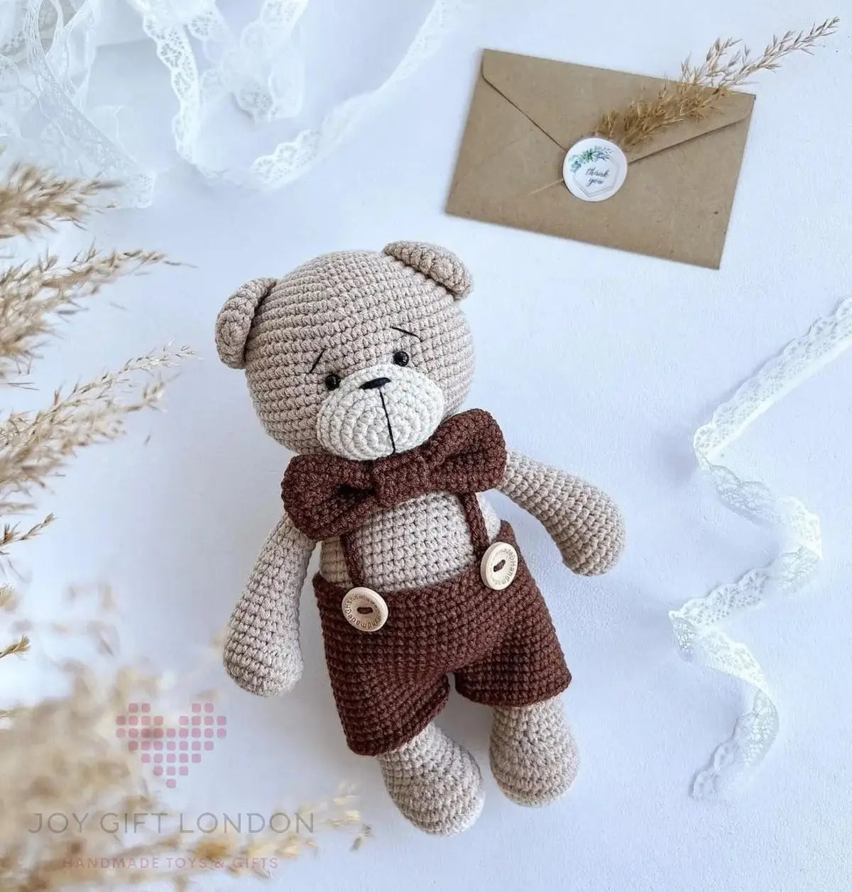 Handcrafted Crochet Teddy Bear with a Brown Bow Tie Joy Gift London