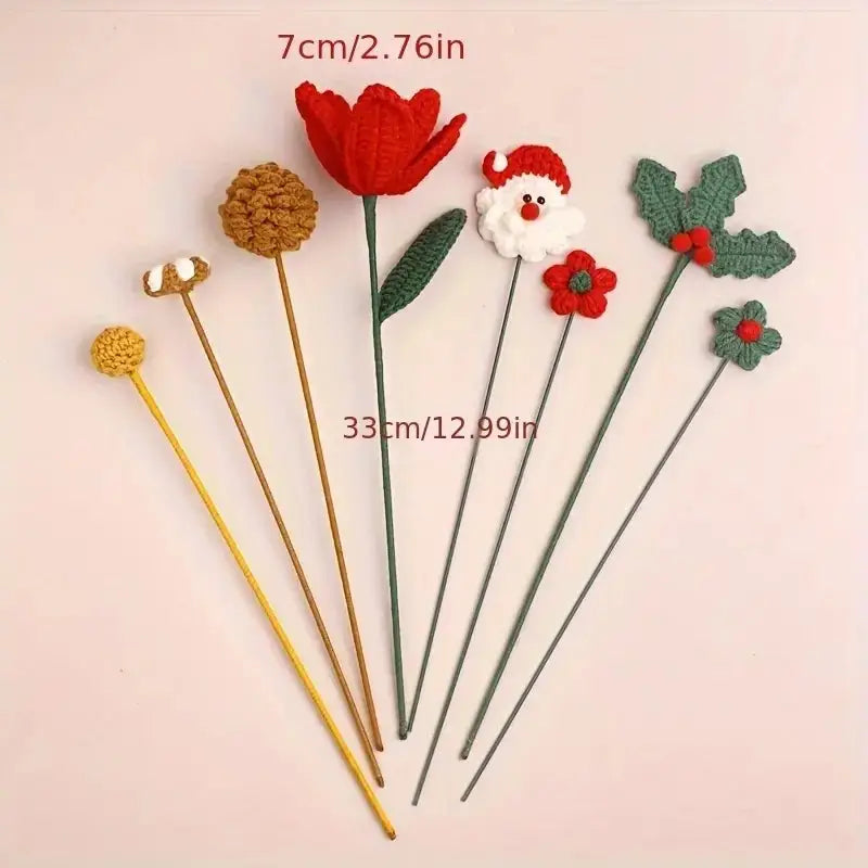 Crocheted Christmas flower stems with Santa, tulip, holly, and festive decorations