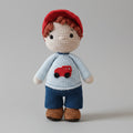 Handmade Crochet Playful Boy Doll with Red Hat – Soft Amigurumi Toy
