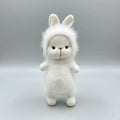 Fluffy white crocheted bunny with fuzzy mane, standing against a gray background.