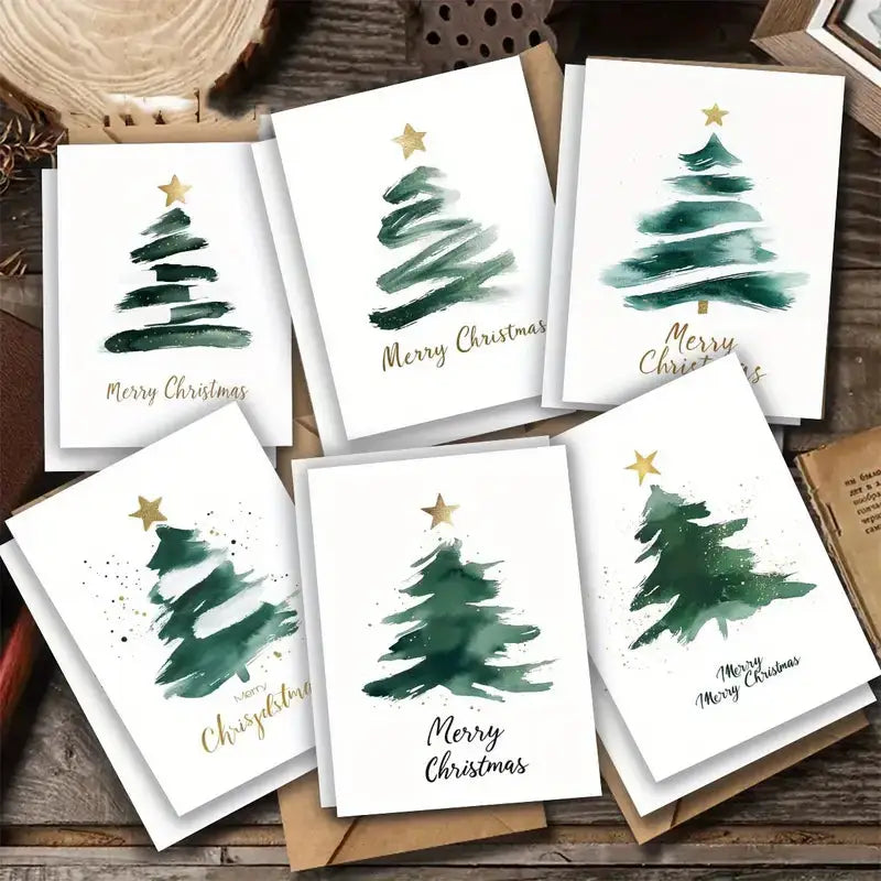 Six watercolor Christmas cards with minimalist green Christmas trees and gold stars, each with "Merry Christmas" in elegant script