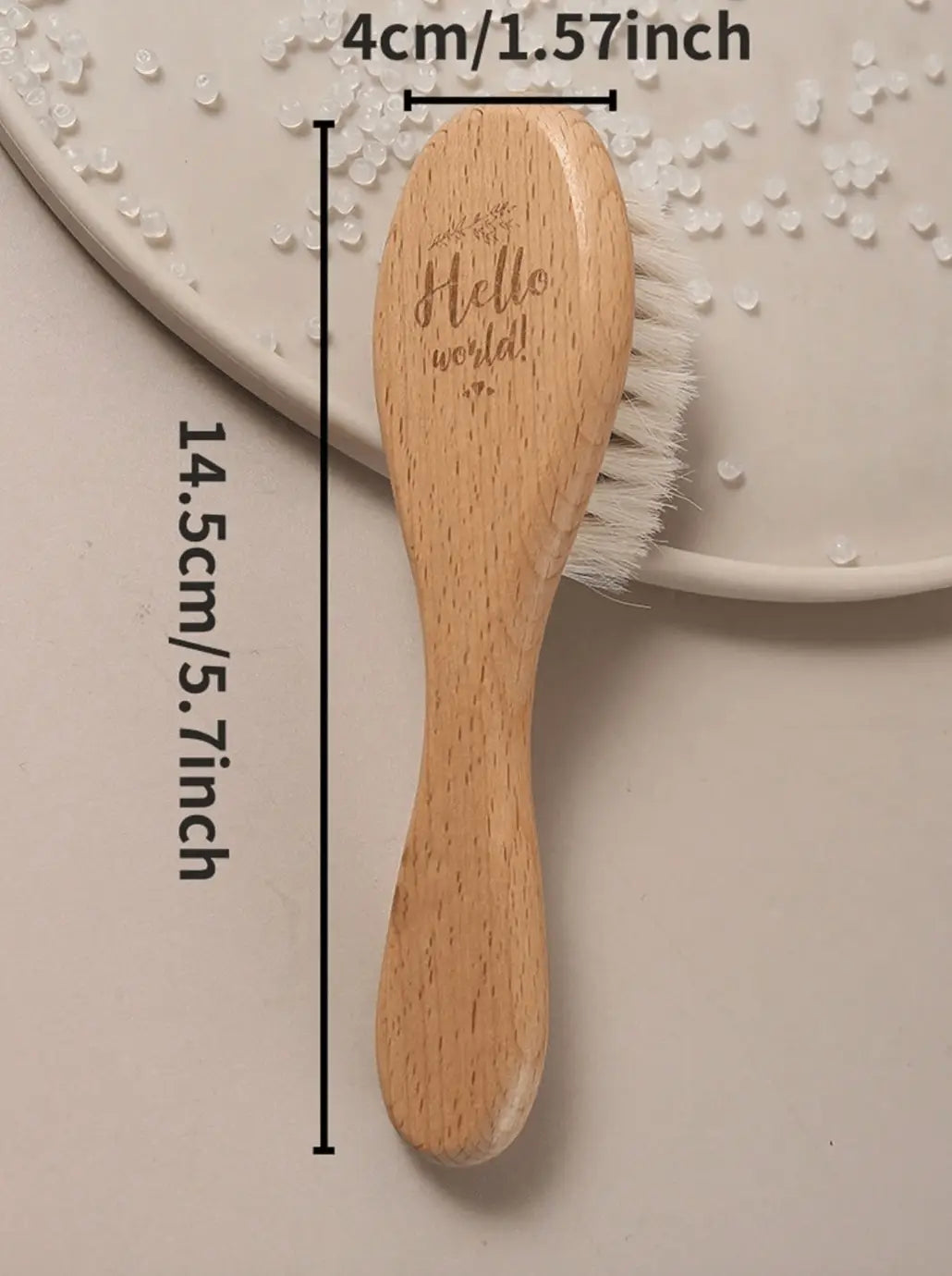 Wooden brush with "Hello world!" engraving, measuring 14.5cm long with white bristles