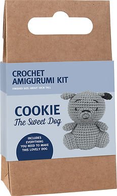 Crochet amigurumi kit with gray knitted dog plush on cardboard packaging