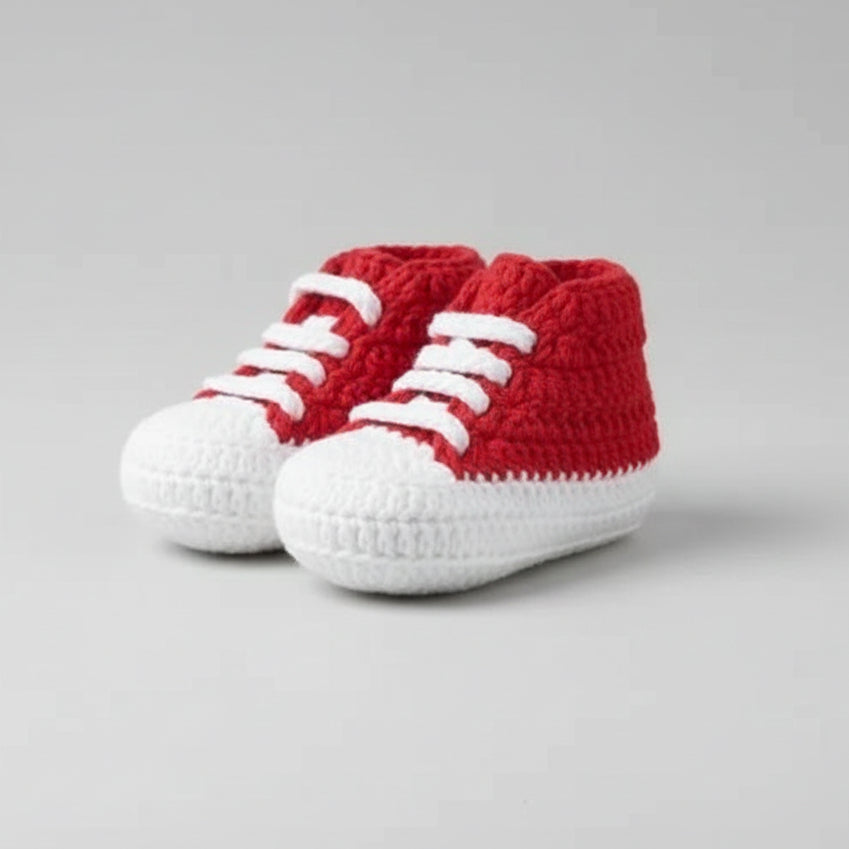 Red and white crocheted baby sneakers with white laces