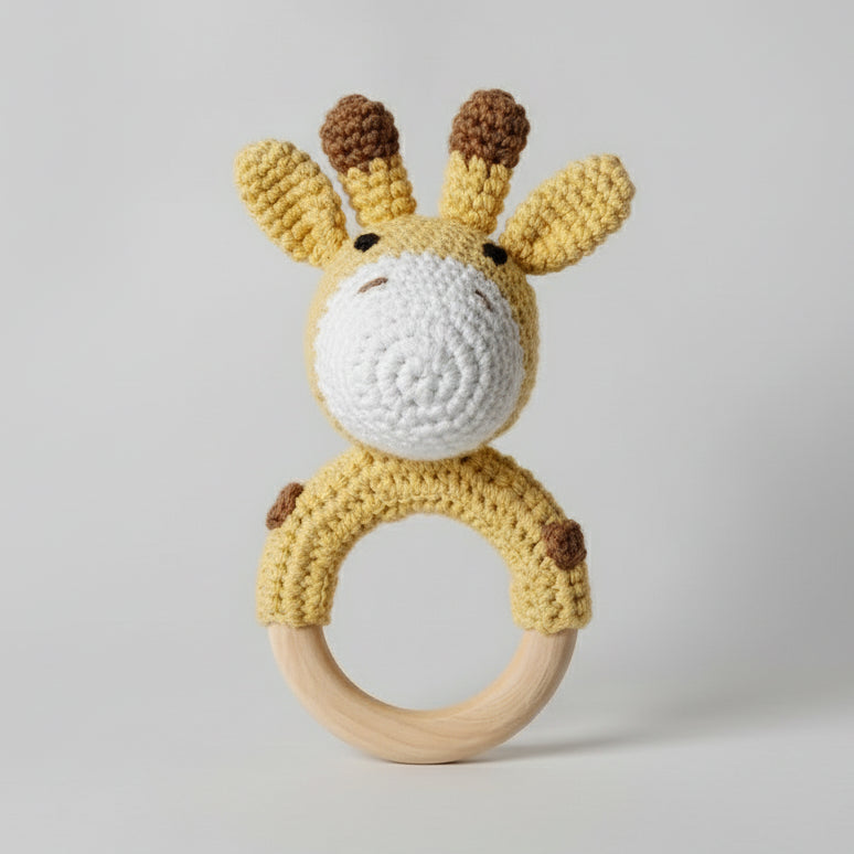 Crocheted giraffe baby teething ring with wooden base, yellow and brown colors