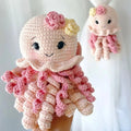 Handmade pink crocheted octopus toys with cute faces and curly tentacles