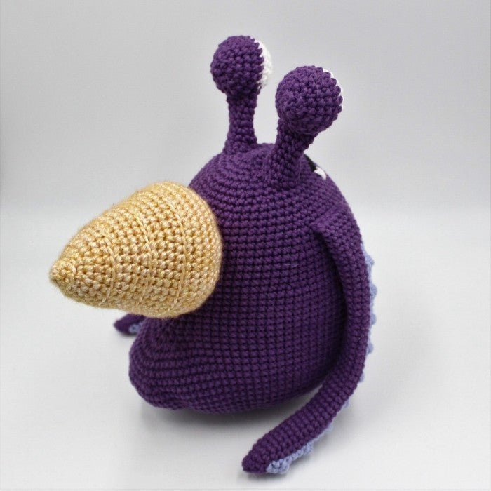 Purple crocheted snail with yellow head, handmade amigurumi craft toy