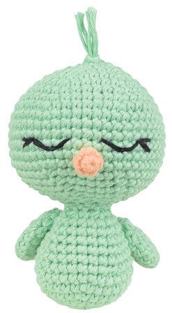 Sleepy crocheted green bird with closed eyes and a small orange beak