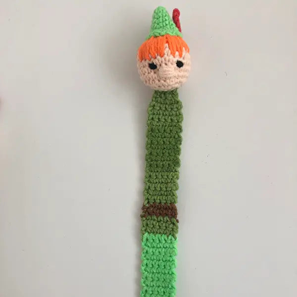 a crocheted toy of a woman's head and neck