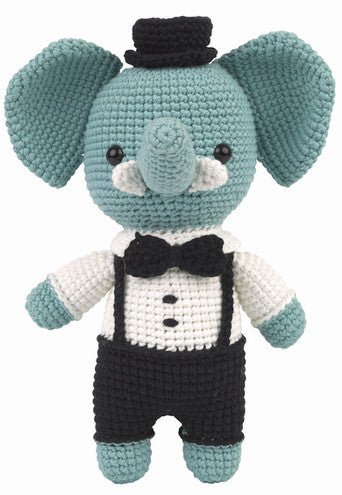 Crocheted blue elephant in dapper tuxedo and top hat, standing upright