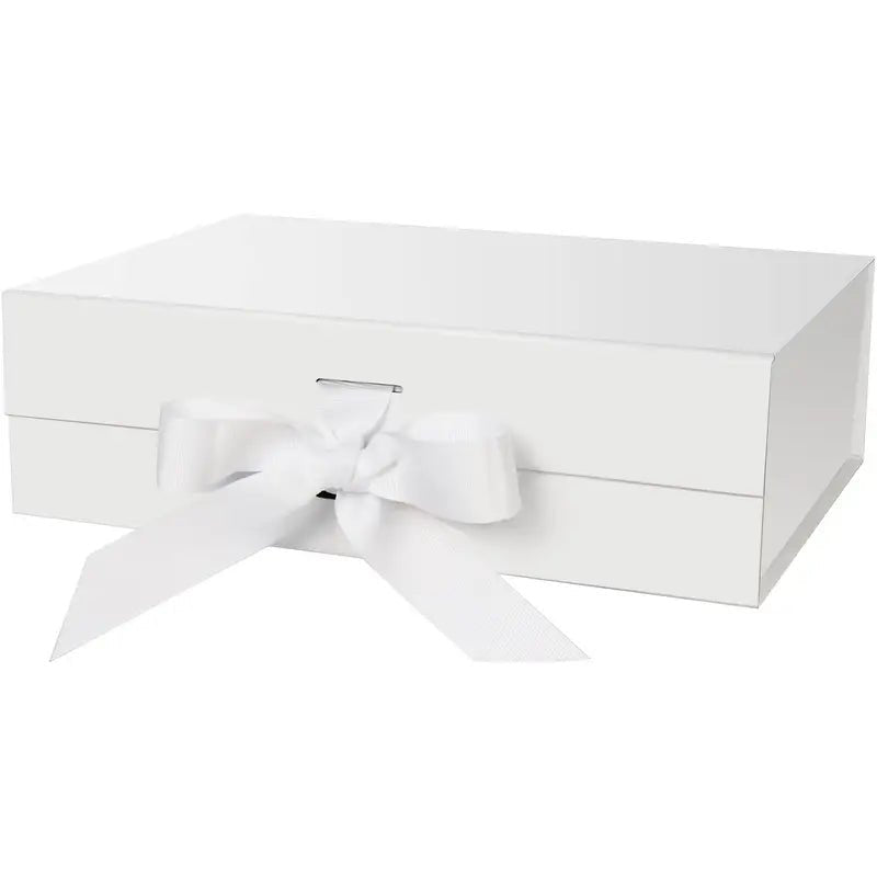 White gift box with elegant white ribbon bow, closed and pristine