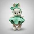 Crocheted bunny in mint green dress with ruffled skirt and bunny ears