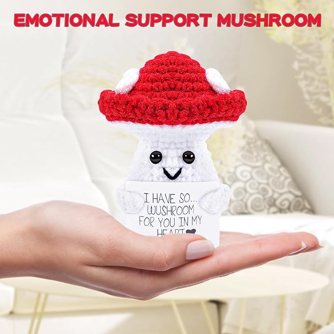 Cute crocheted mushroom with "I have so wushroom for you" pun on palm