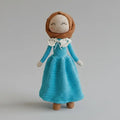 Crocheted doll in blue dress with white collar, brown hair, closed eyes
