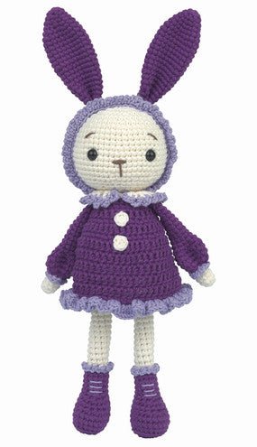 Purple crocheted bunny doll wearing a coat and boots with long floppy ears