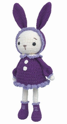 Purple crocheted bunny doll wearing a dress, with long ears and button details