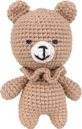 Crocheted tan teddy bear with round ears and simple embroidered face