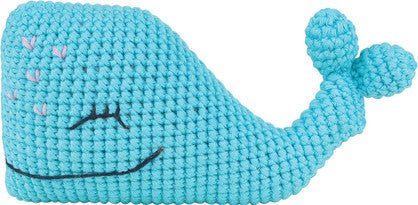 Blue crocheted whale plushie with a cute smiling face, crafted in a textured stitch pattern