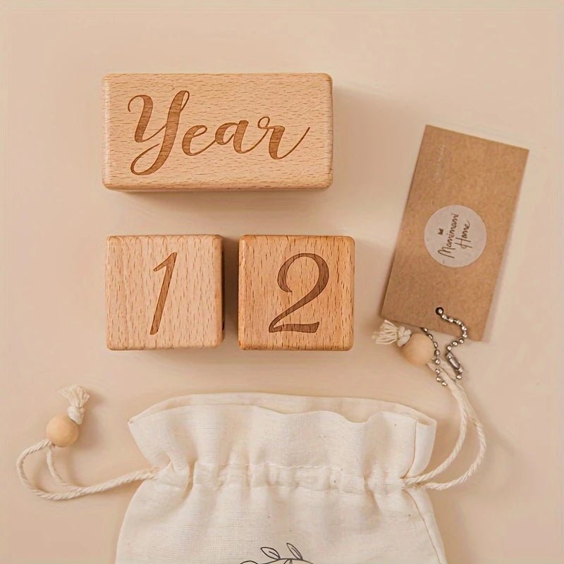Wooden blocks spelling "Year 12" with drawstring bag and kraft paper tag