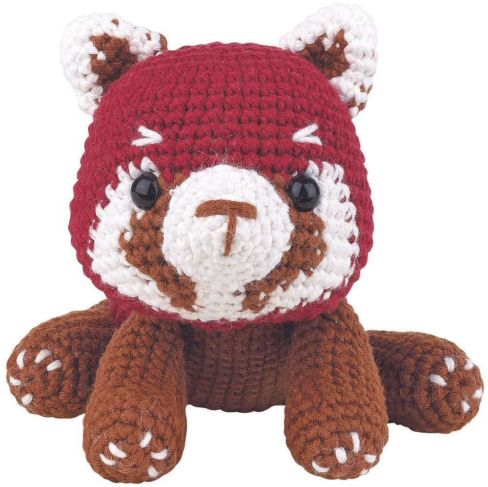 Crocheted red and brown fox stuffed animal with cute button eyes
